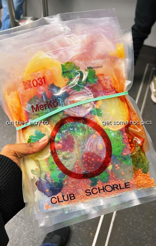 Vacuum-sealed ingredients held as an archival specimen with Club Schorle typography