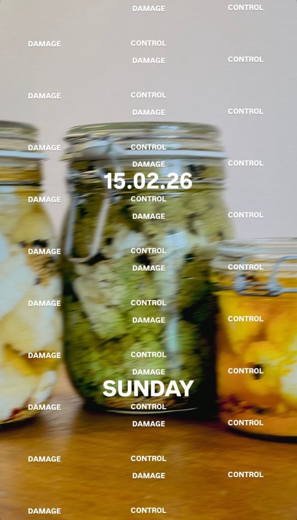 Preserving jars with DAMAGE CONTROL typography overlay